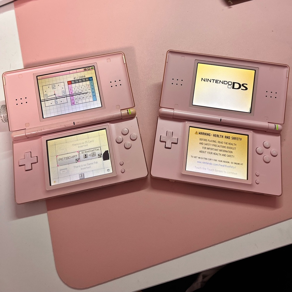 2 Coral Pink Nintendo DS Lites for parts and repair (read description)
